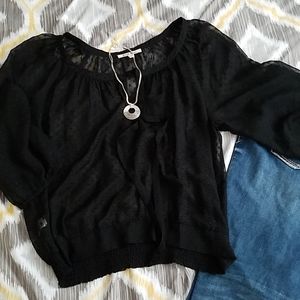 Sheer black blouse